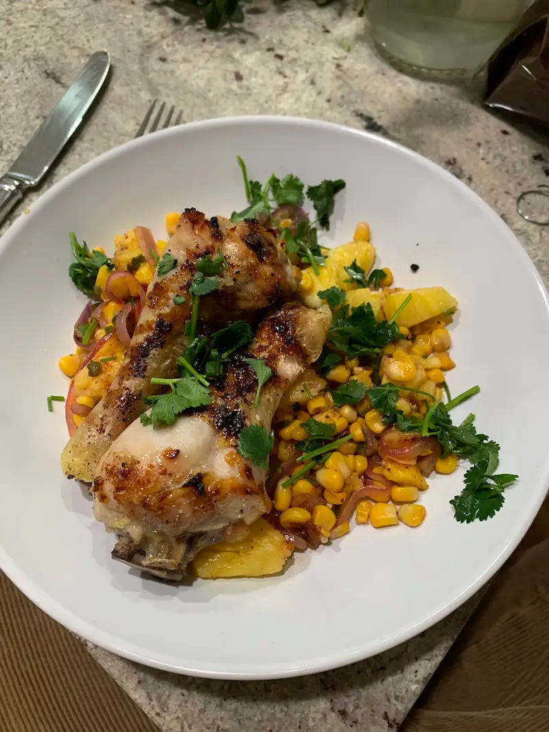 Honey glazed chicken with a pineapple, corn, jalapeño salad